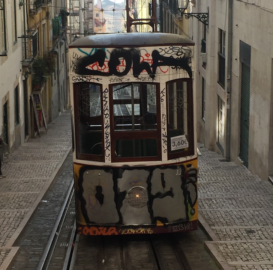 Rua da Bica de Duarte Belo really comes alive in Lisbon at night